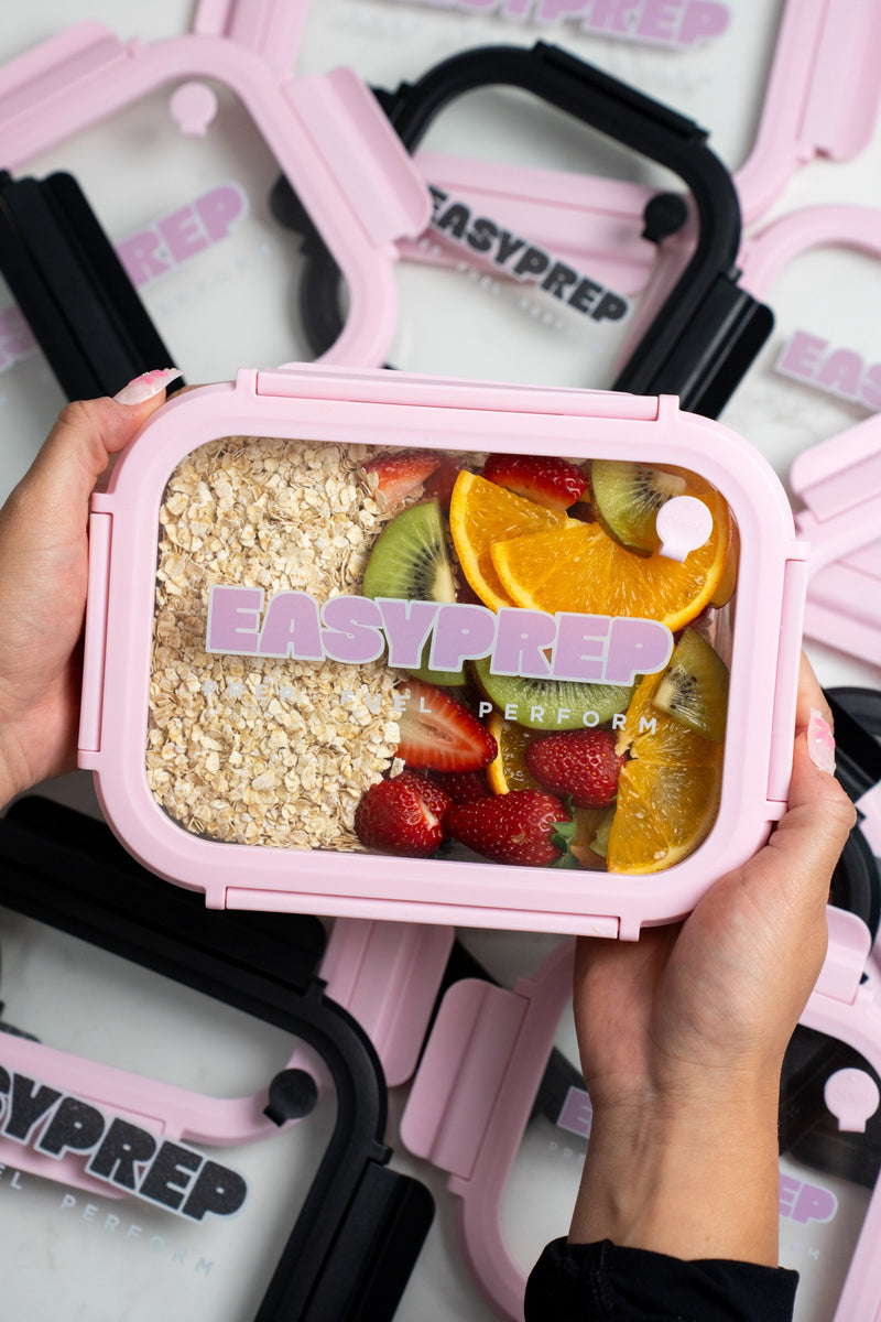 Pink Easy Prep container filled with fruit and oats